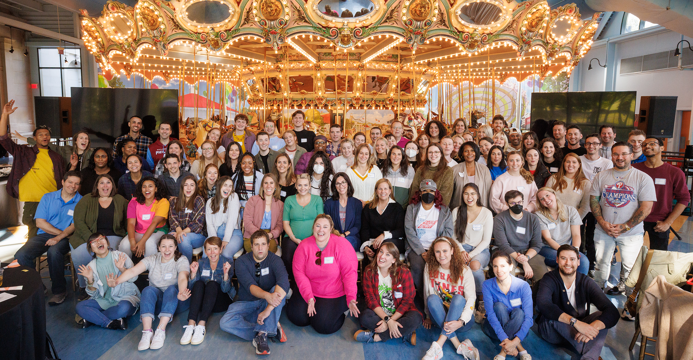 100+ smiling Tierney Employees at the Please Touch Museum retreat